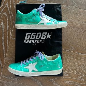 Golden Goose Superstar in metallic green.Excellent condition. size 38